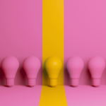 foto ilustrativa de foco de luz rosas con uno amarillo en el medio que marca la diferencia entre el monton